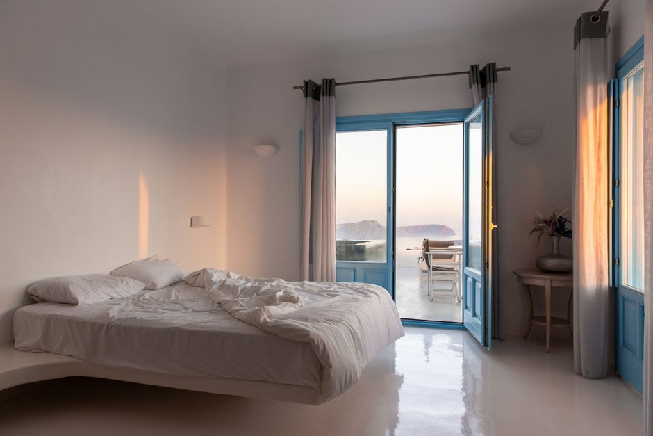 A boutique accommodation with a sea-view jacuzzi or pool and comfortable outdoor lounging space.