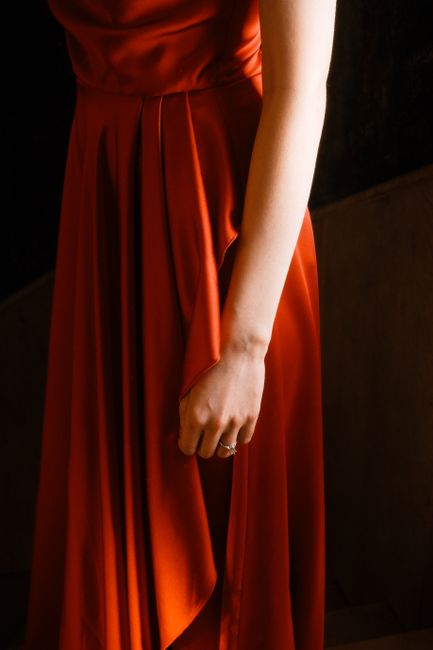 A garment detail featuring a structured puff sleeve or bow that holds its shape.