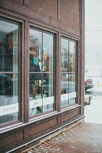 Interior of a small customer-facing business such as a shop or salon with open public traffic areas.