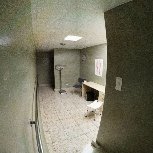 A treatment bay or outpatient care area with partitions and an open, bright layout.