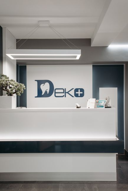 Medical office interior with glass partitions suited to retrofit or renovation planning.