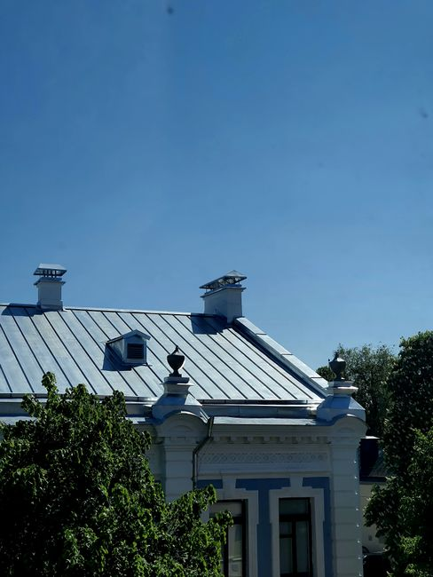 Close-up of roof flashing installed around a roof penetration on a residential roof.