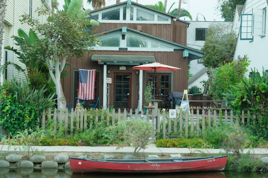 Exterior view of a single-family house where a rear or side room addition might be evaluated.
