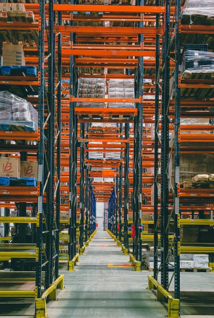A collage-style view of a food processing space, a laboratory corridor, and a data center aisle.