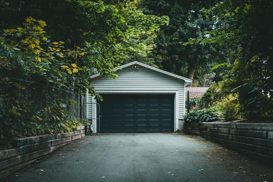 Residential backyard with a shed, fence, and existing outdoor space that could constrain ADU placement.