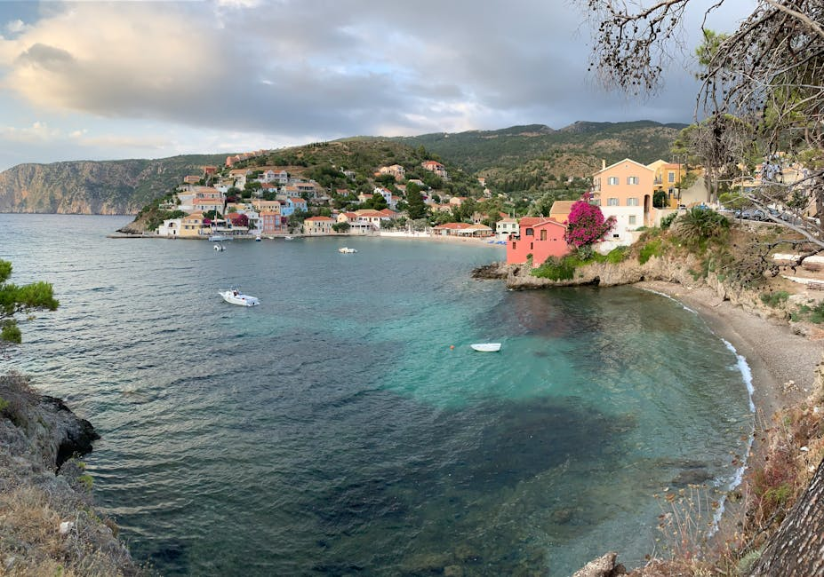 A quiet seaside village scene in Lesbos with stone buildings, coastal views, and a calm harbor atmosphere.