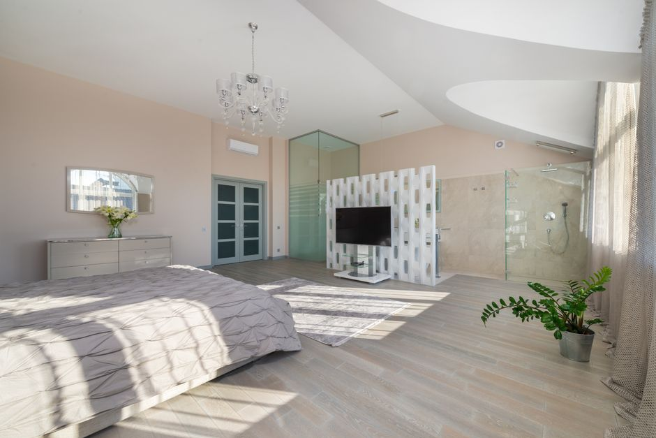 Modern interior examples of glass applications such as a conference room wall, shower enclosure, or residential divider.