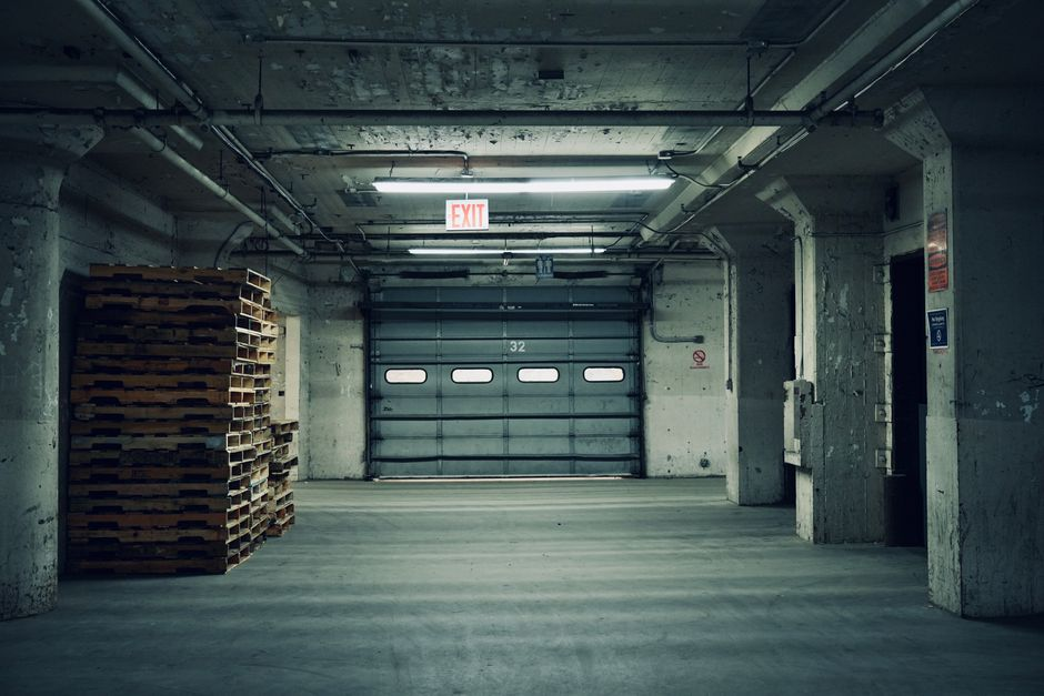 A close view of a sealed gap at an industrial door or loading dock entry point.