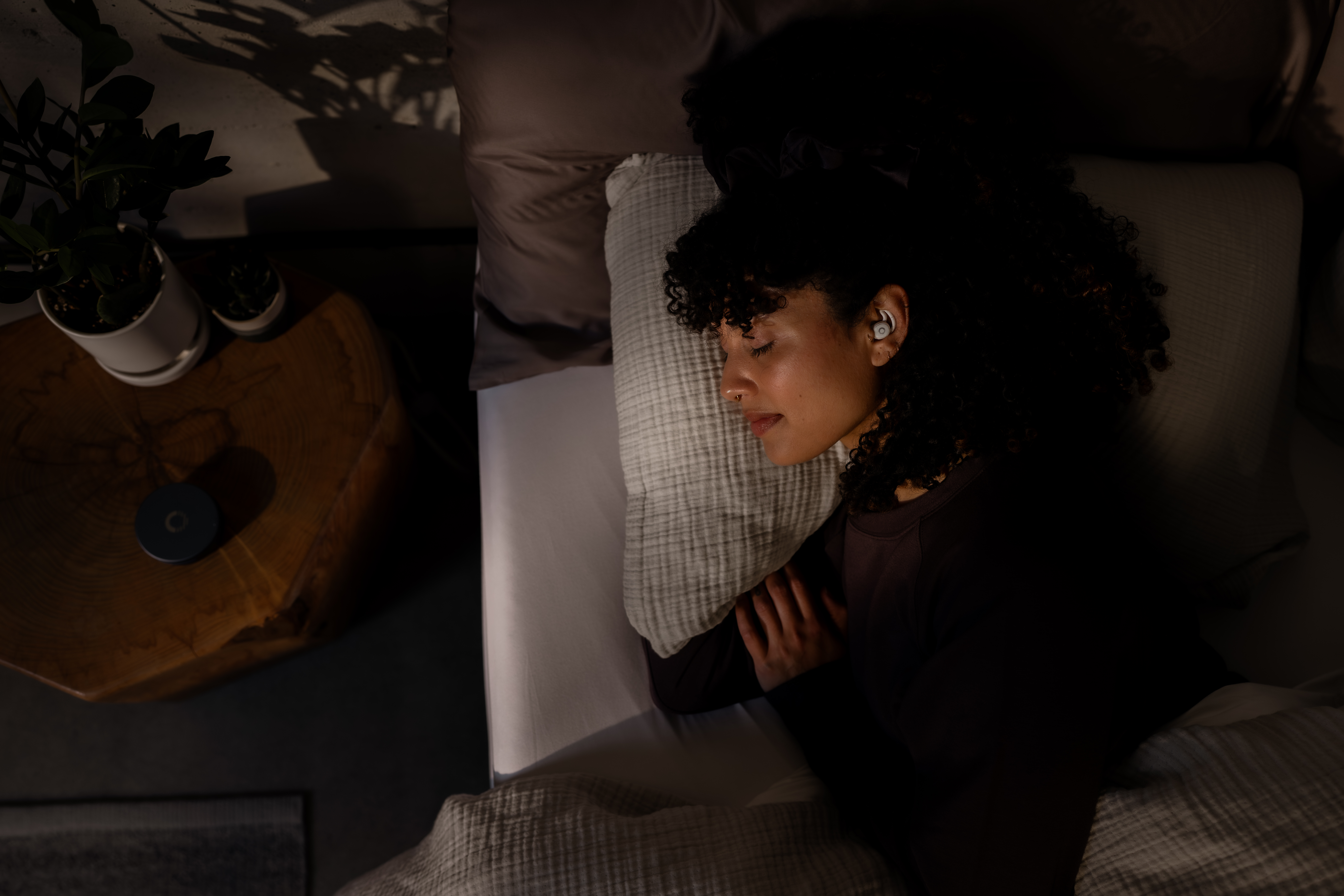 Sleeping, earbuds, bedroom